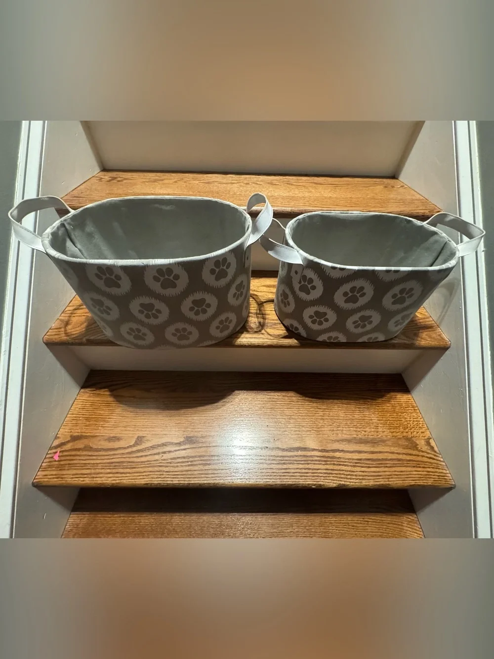 Set of gray & white paw print canvas storage baskets with white leather handles